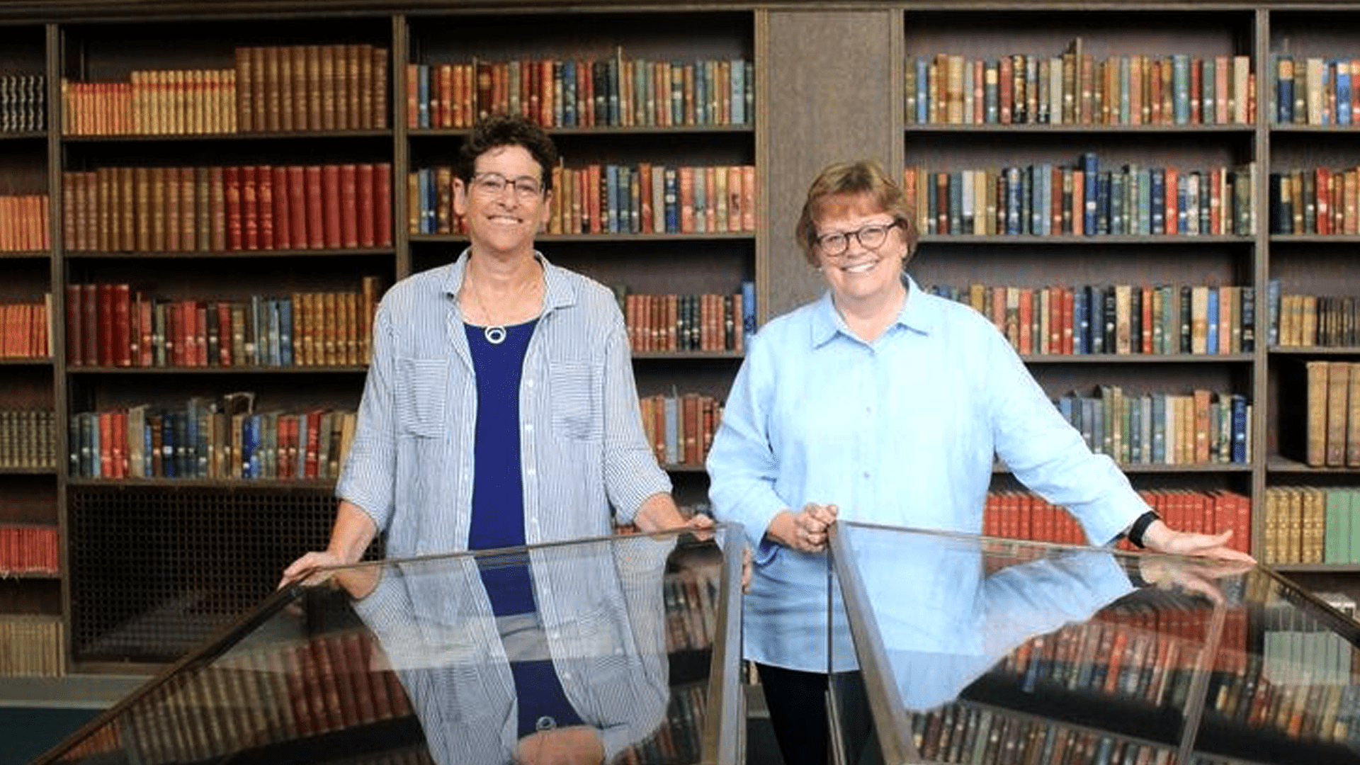 Judith Raiskin and Linda Long in the library