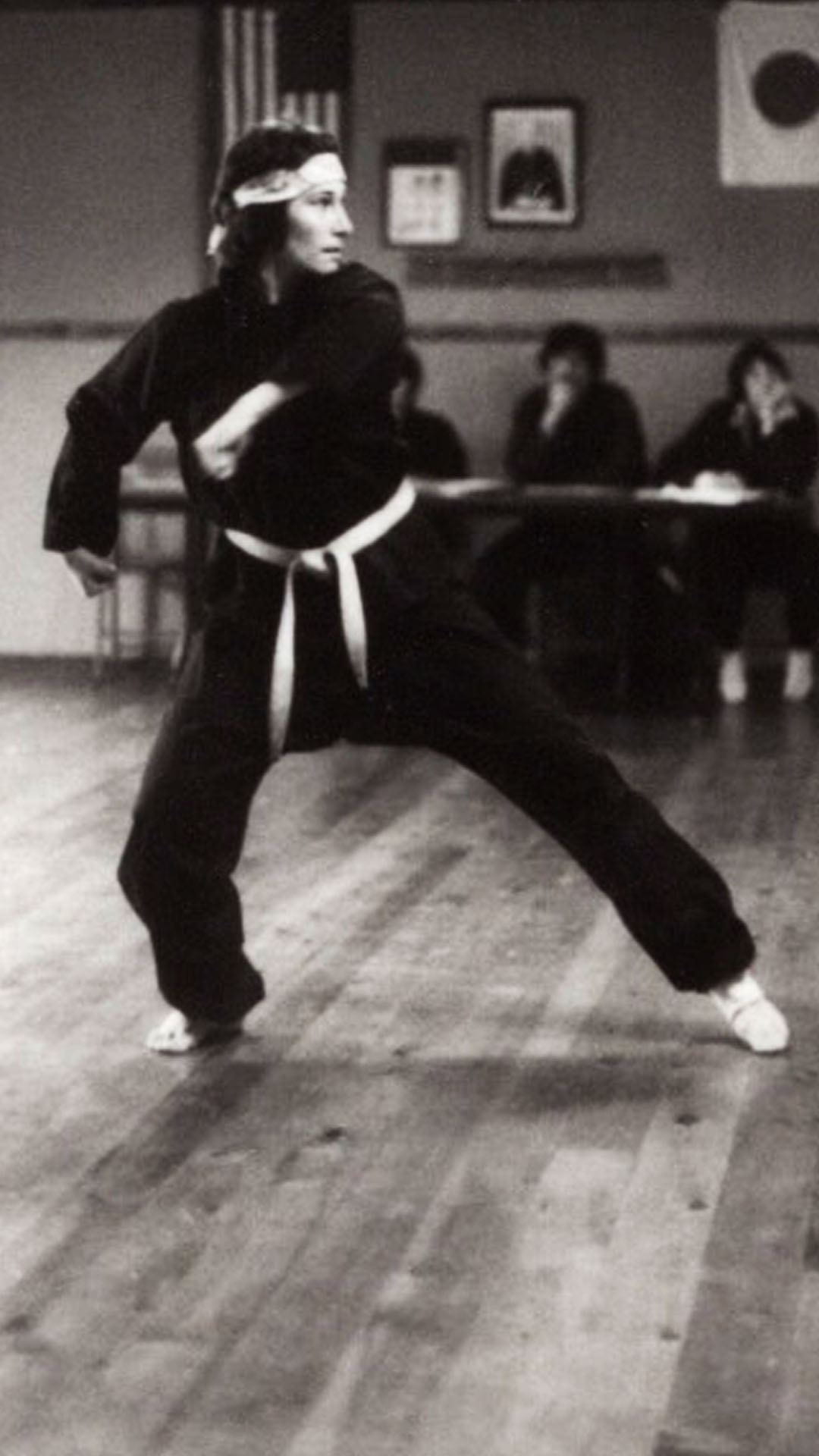 Woman in a kung fu pose